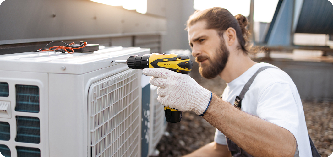 Service Areas (Demo) 2 male worker repairing conditioner while using dril 2024 12 10 04 06 45 utc 1