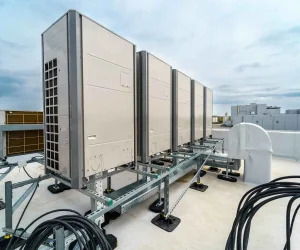 HVAC system components including rooftop commercial condensing units, refrigerant lines, electrical