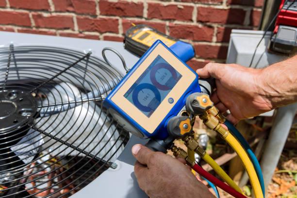 EPA certified technician handling refrigerant properly during AC repair
