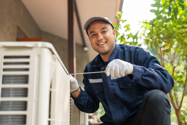 Professional AC technician performing same-day repair in Houston