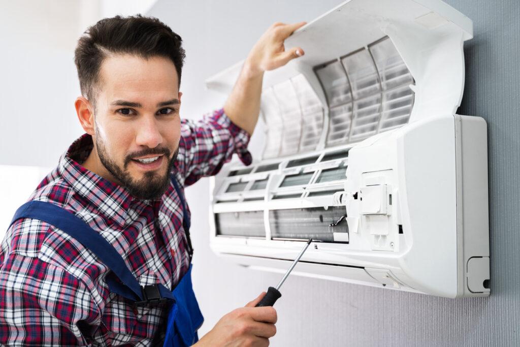 Happy homeowner with reliable AC service technician