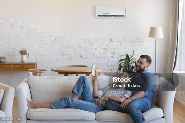 Satisfied Houston homeowner enjoying reliable AC cooling