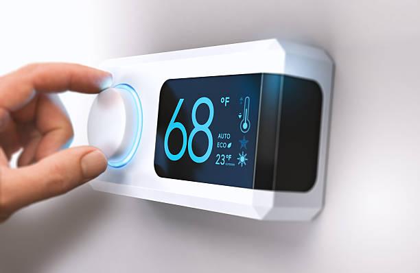 Smart thermostat displaying heating system diagnostics and alerts